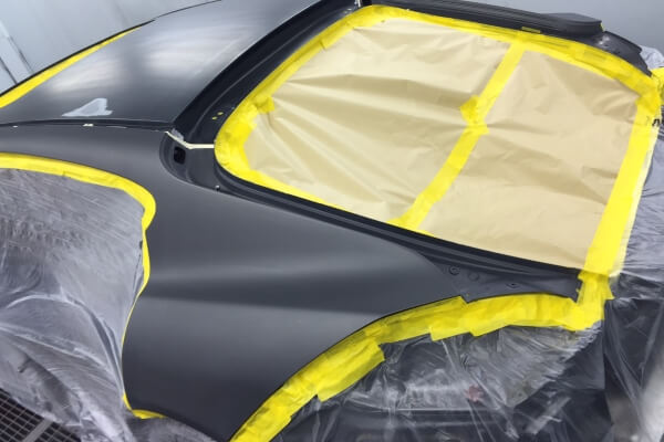 Q1 Car painters tape applied to a car